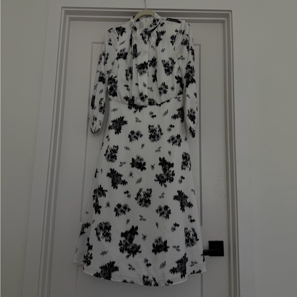Ann Taylor’s Ikat Floral Mock Neck Flare Dress - Picture 5 of 9